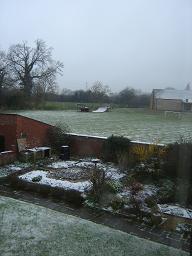 And the next day, the garden and the fields next door were covered in snow.